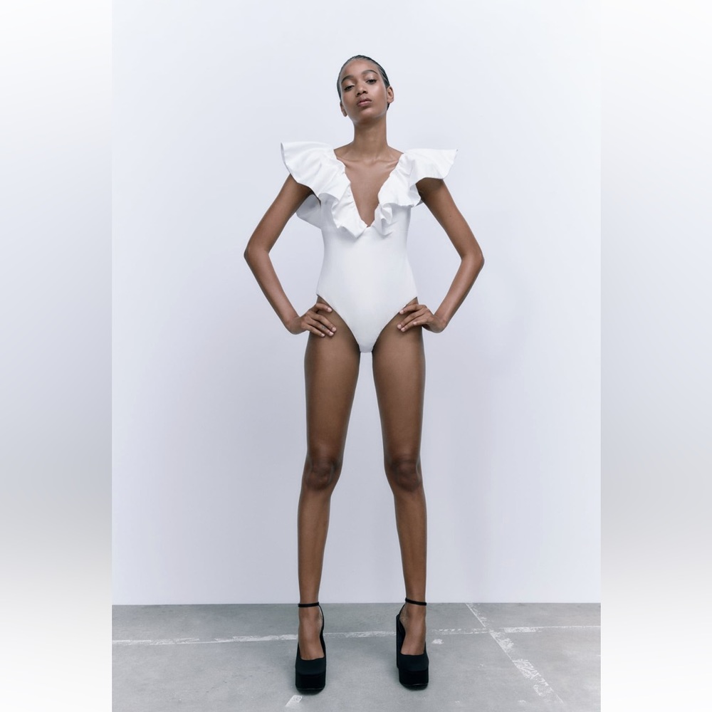 RUFFLED BODYSUIT